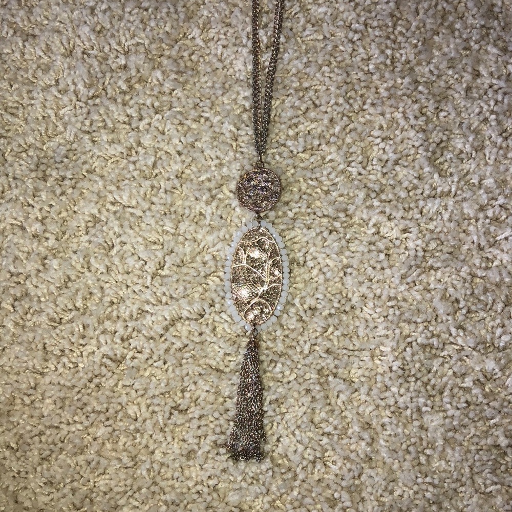 Long gold pendant necklace